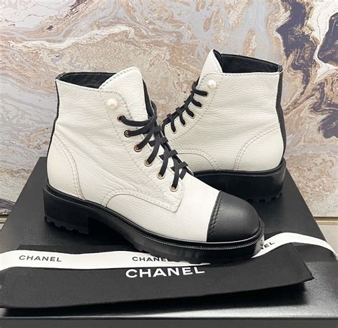 chanel pearl chain combat boots|chanel interlocking boots.